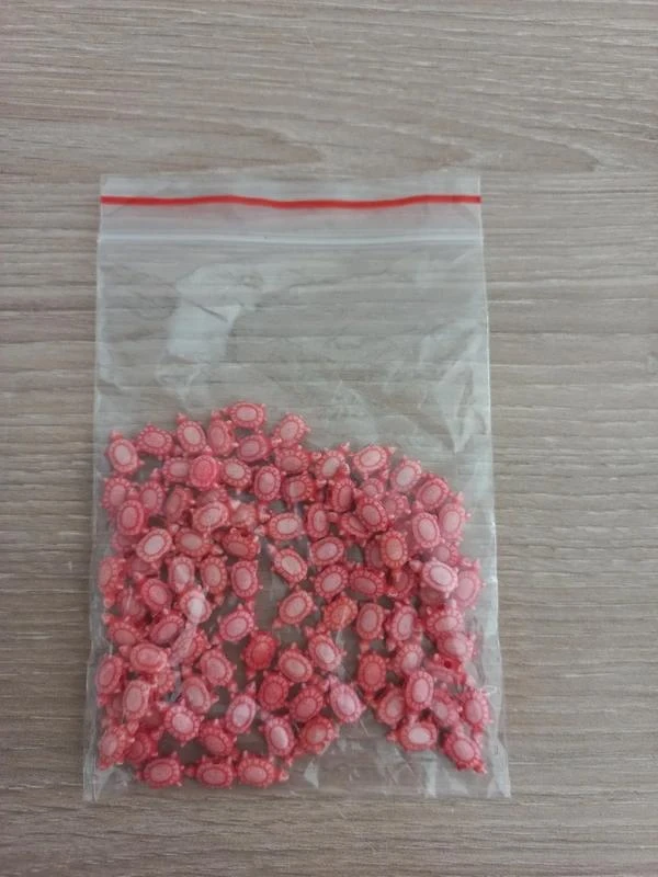 Lote de cuentas acrílicas rojas "Tortuga"